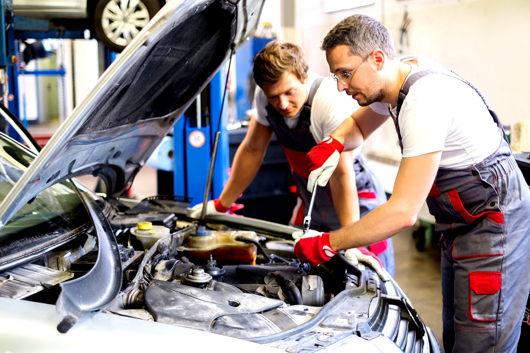 Mechanic Fixing Car